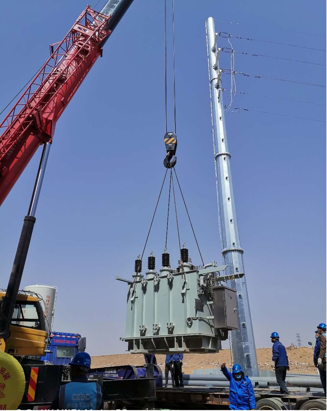 國源公司榆林生活垃圾發電項目主變壓器成功就位 (1).jpg